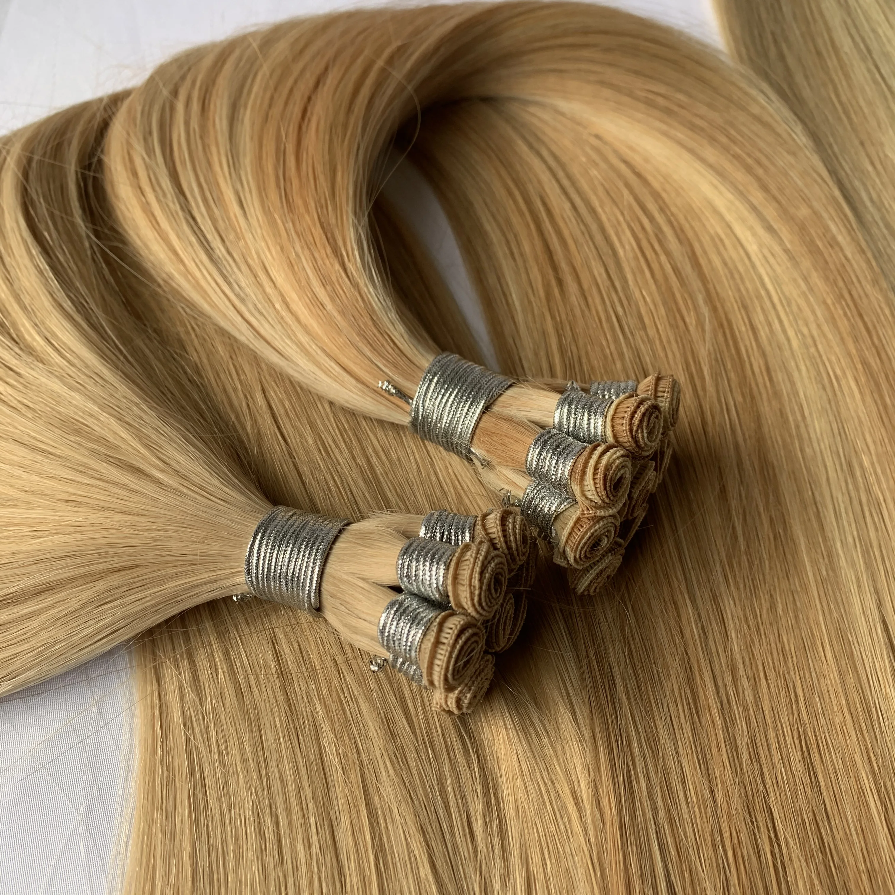 

Double Drawn Hand Tied Weft Human Hair Extensions Top Quality 100% Russian Virgin Cuticle Aligned Remy Blonde Beaded Weft