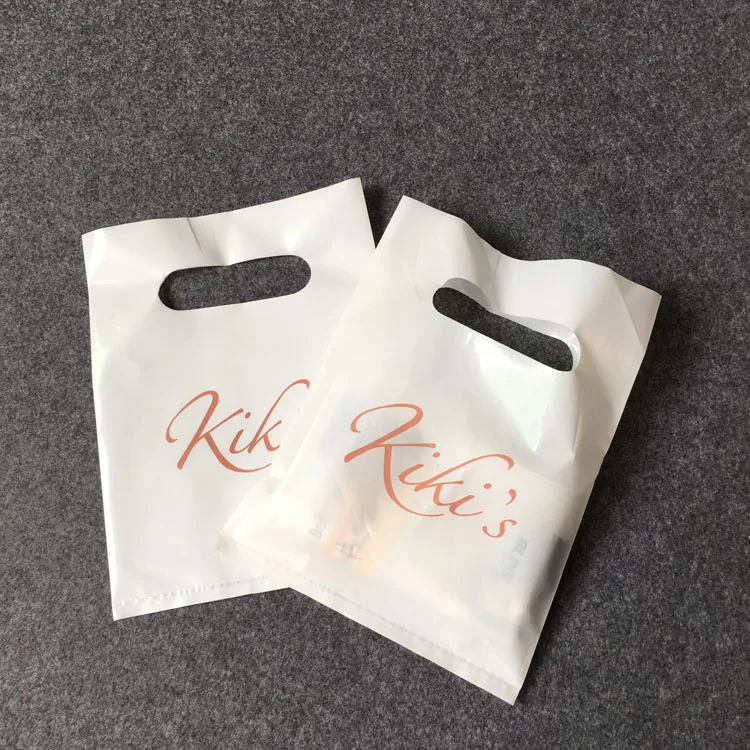 

Hot Selling Cheap custom logo printed reusable foldable handle pink shopping mailing bags Die Cut plastic carry bag, Cmyk