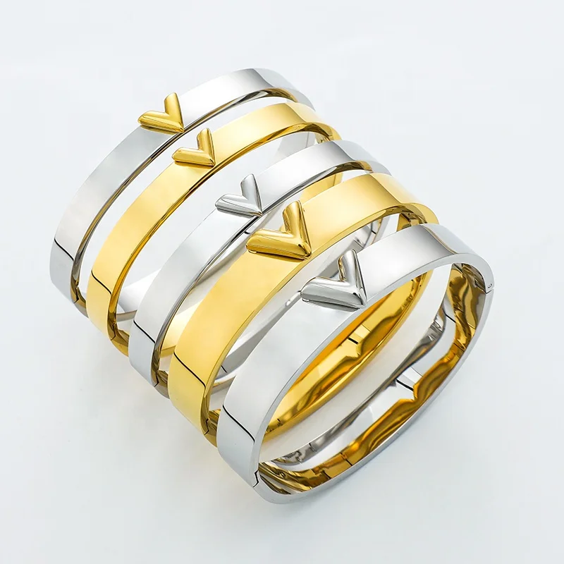 

Hot Sale Fashion Minimalist Stainless Steel Three Dimensional Letter Relief V Shaped 10mm Thick Bangle Bracelet