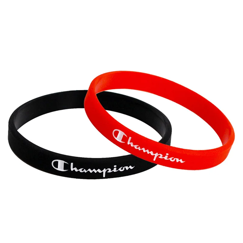 

Custom debossed WE ARE CHAMPION silicone debossed ink filled silicone wristband, Customized color