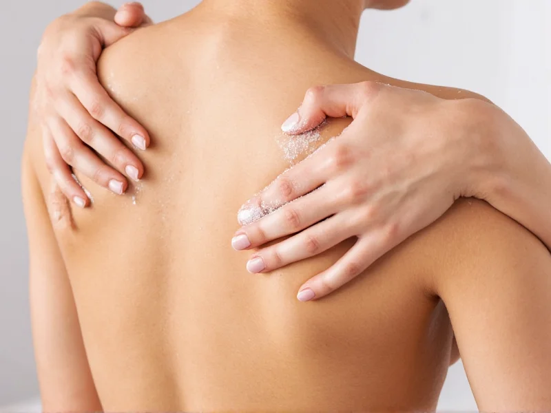 Applying natural body scrub in circular motions