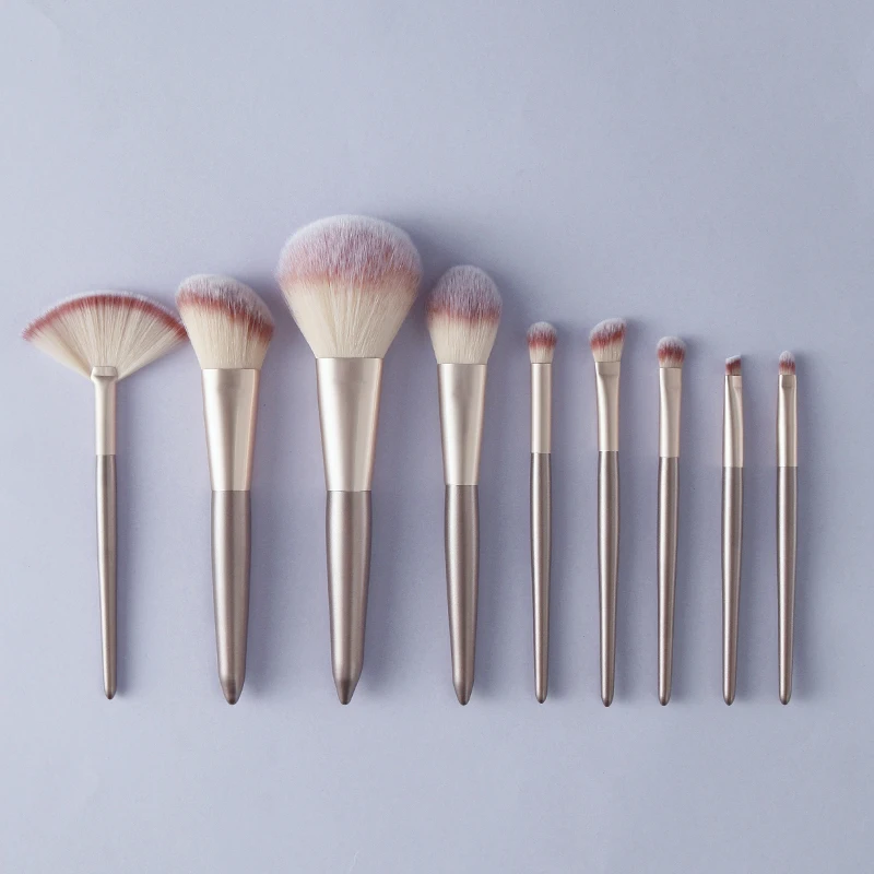 

High quality vegan wholesale professional makeup brush private label brushes 9pcs golden makeup brush set with bag