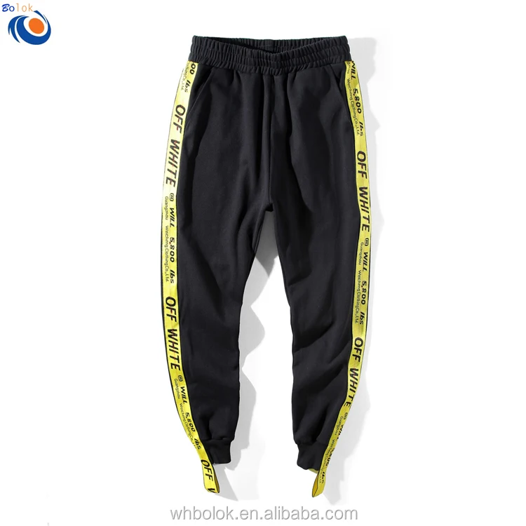 off white track pants yellow stripe