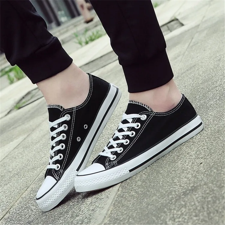 

Wholesale men and women canvas shoes, White ,black,red,blue