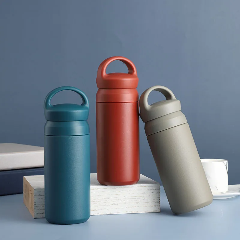 

Hot selling insulated shaker bottle creative matte stainless steel portable cup for outdoor driving with handle, Custom