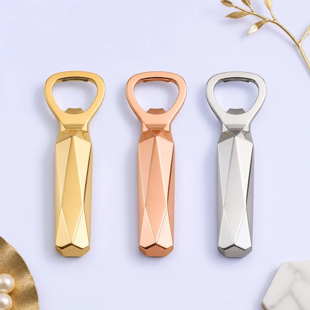 Three faceted bottle openers in gold, rose gold and silver finishes with decor props