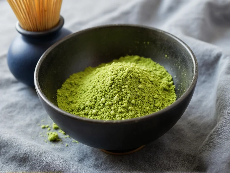 Blue Bottle Craft Matcha powder in ceramic bowl with bamboo whisk