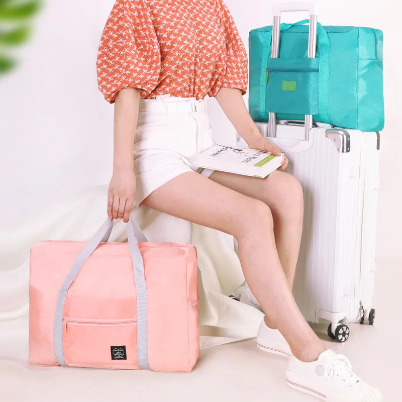 

New Shelves foldable large capacity waterproof pink travel duffel bag travelling bag for women