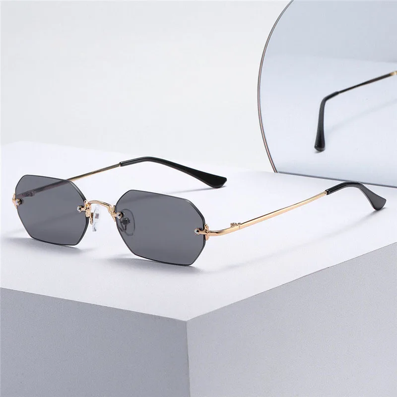 

Bulk wholesale 2021 trendy hot sale gradient lens metal temple frameless rimless rectangle sunglasses 2021