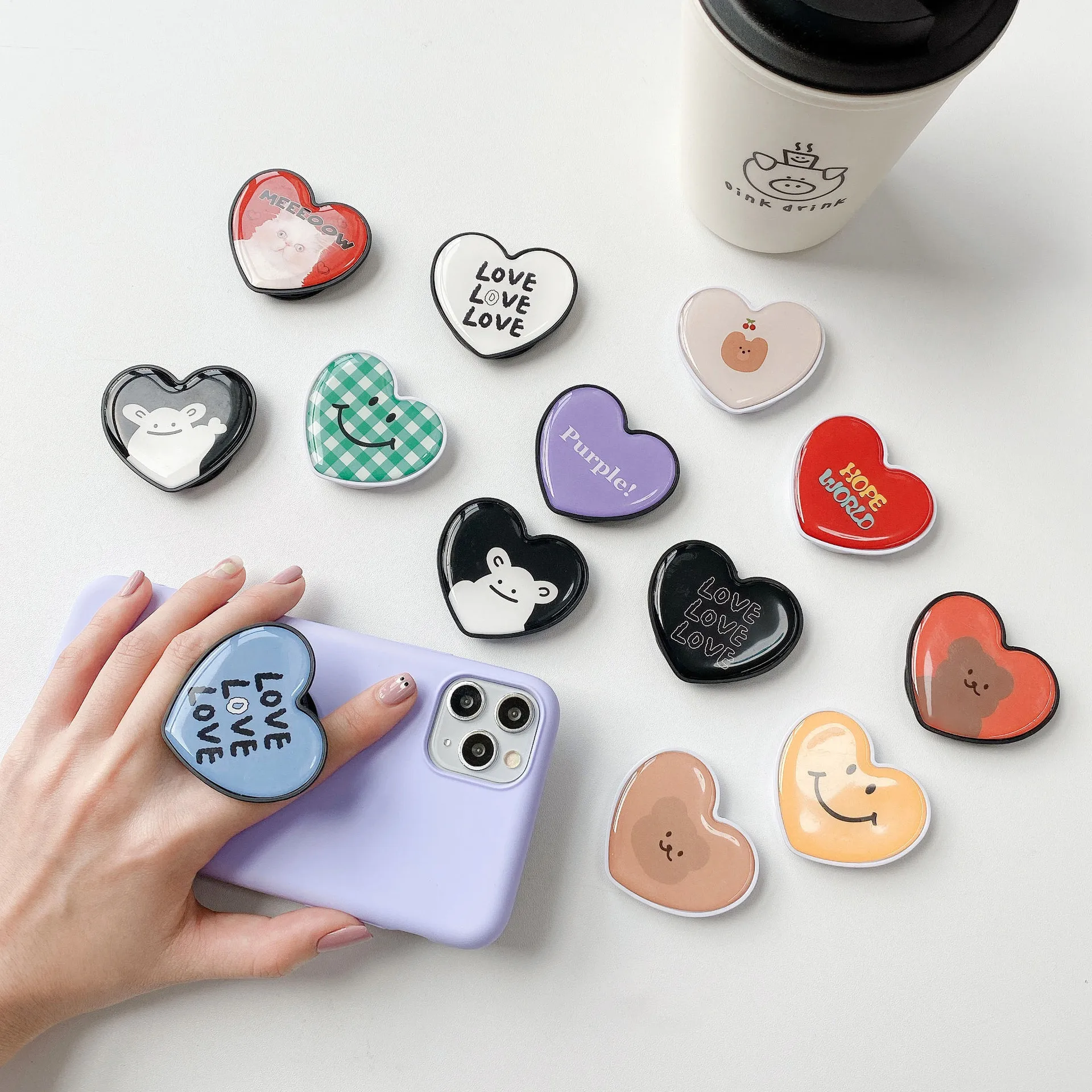 

Wholesale Smile Heart-shaped Mobile Holder Custom Logo With Epoxy Resin Phone Grip Cell Phone Stand For Phone Sockets