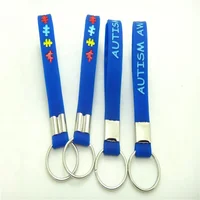 

2020 Hot selling Autism Awareness silicone keychain royal blue debossed ink filled silicone keychain