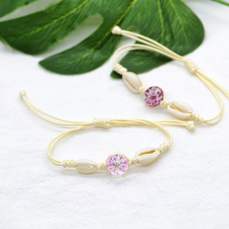 

Creative hand-woven girl plant dried flower shell bracelet bracelet glass crystal real flower stitching bracelet