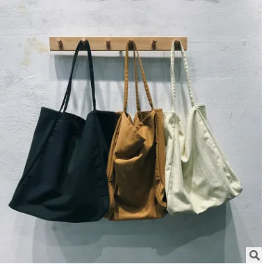

South Korea's new large capacity minimalist casual one-shoulder canvas bag simple portable women's bag solid color tote bag big