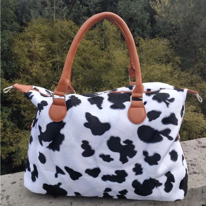 steve madden cow print purse