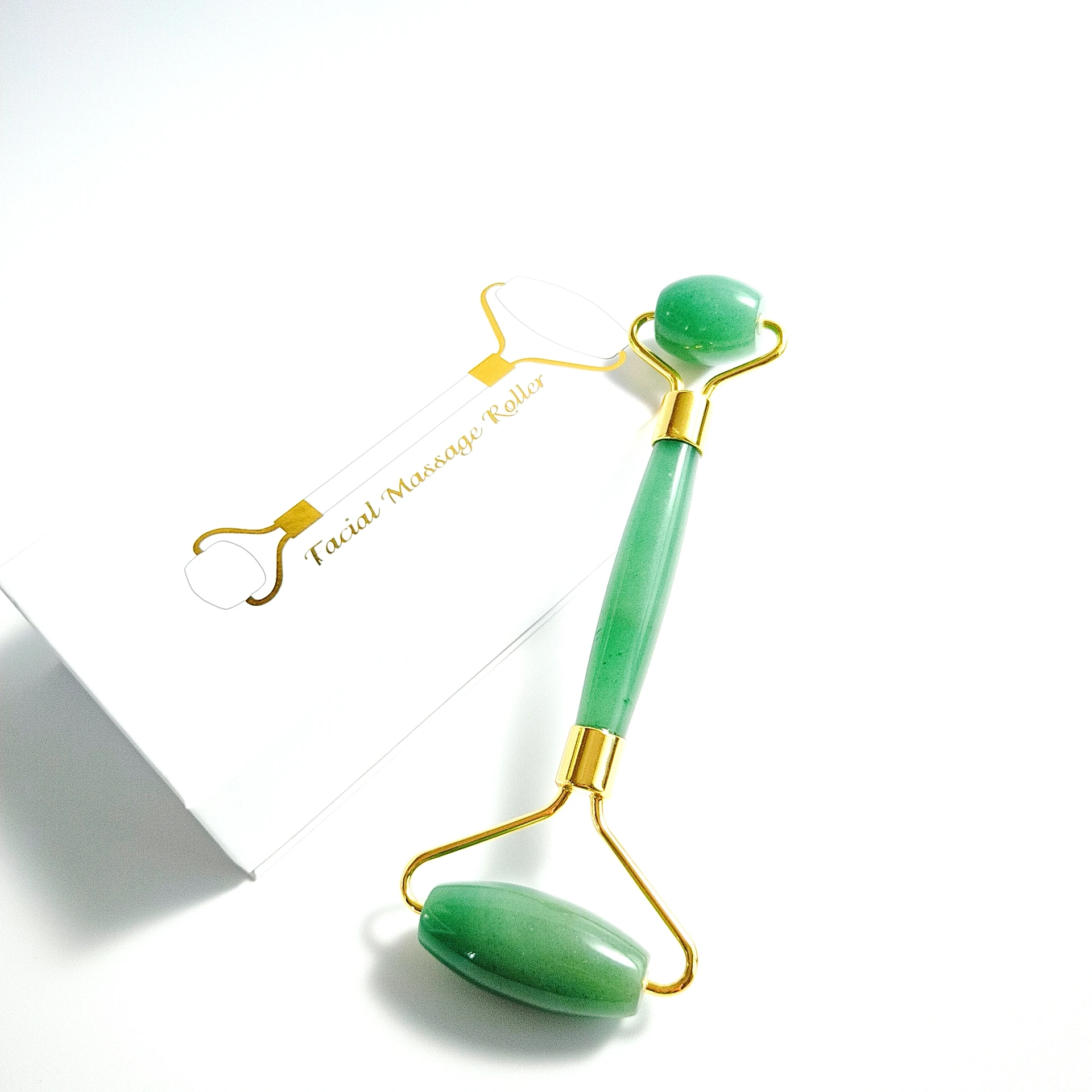 

Quartz facial roller. Green aventurine Skin massager. Facial roller
