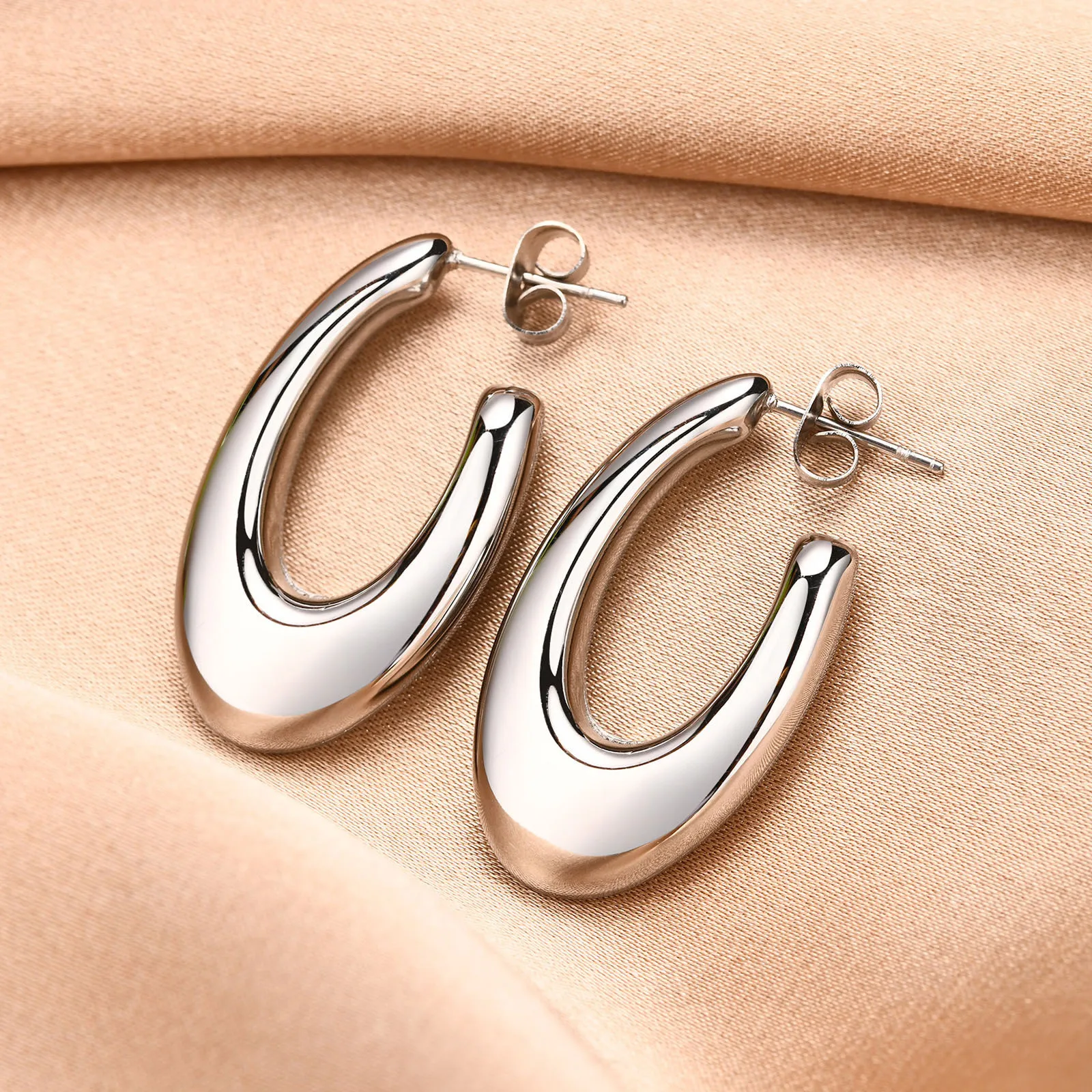 

Classic Simple Stainless Steel Gold Plating Water Drop Stud Earrings High Polished Stainless Steel Oval Shape Hoop Earrings