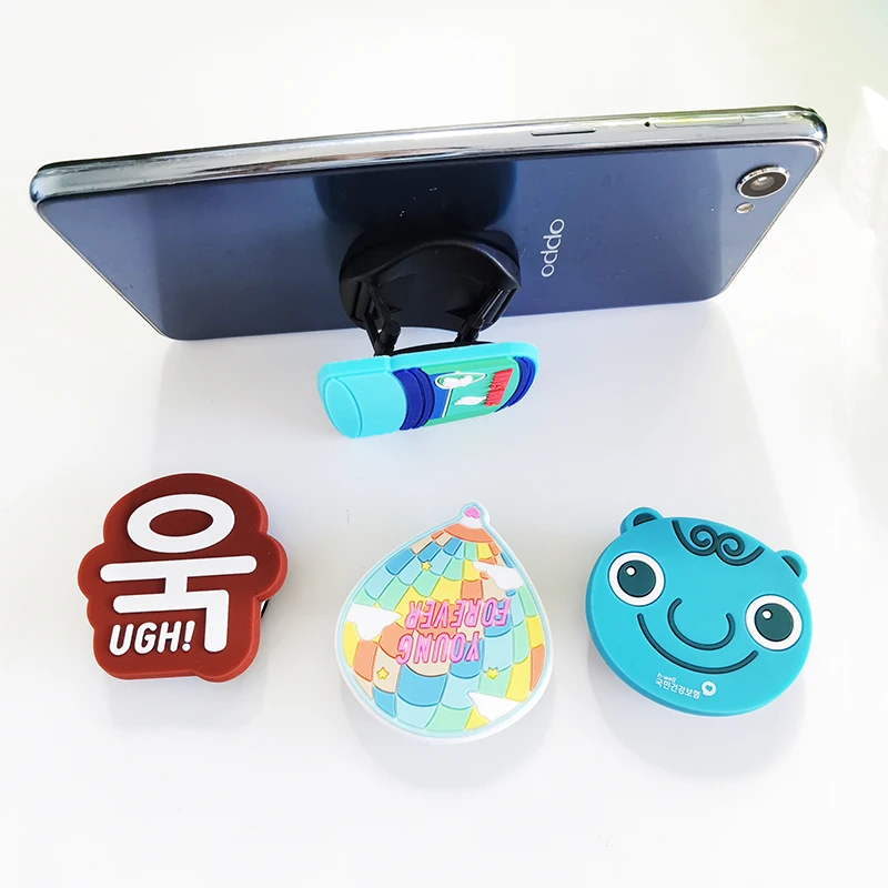 

wholesale multi function silicone pvc cute cartoon foldable retractable cell phone holder for airbag bracket