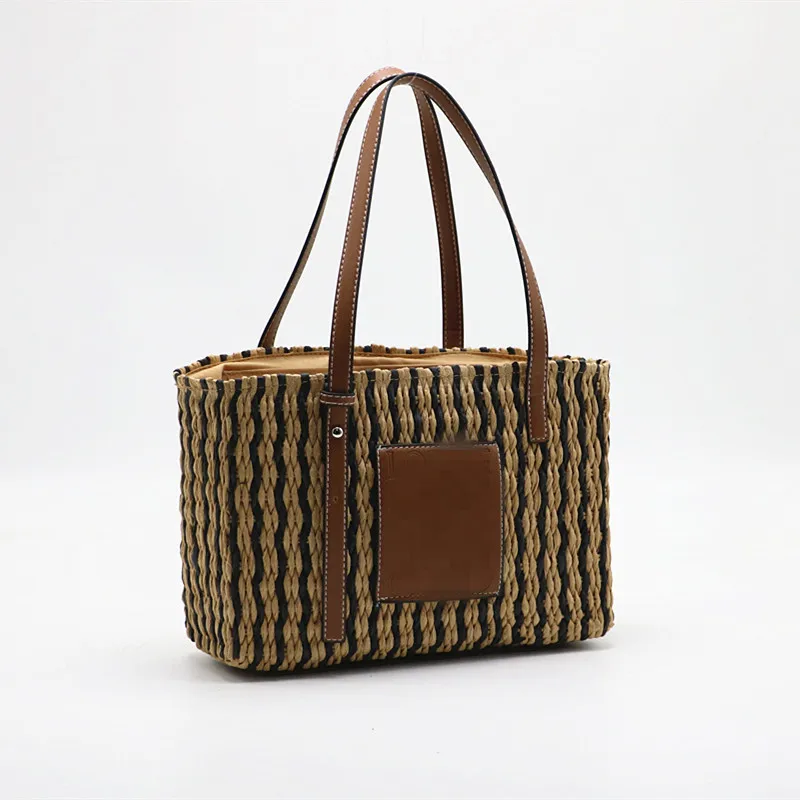 

2021Spring and Summer Ladies Hollow Out Beach Vacation Hollow Out Bag Simple Fashion Handheld Straw/Coarse twine Weaving Bag, Accept custom made