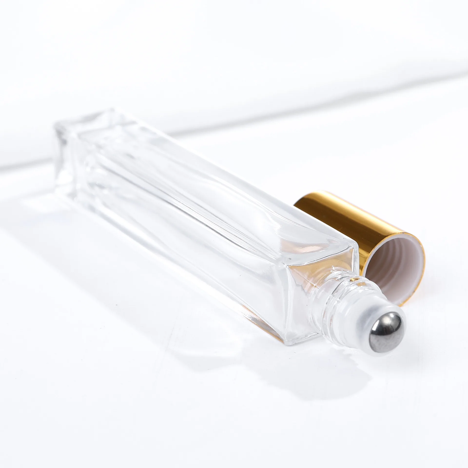 

Custom luxury 10ml clear rectangle stainless steel roller ball roll on perfume essential oil glass bottle
