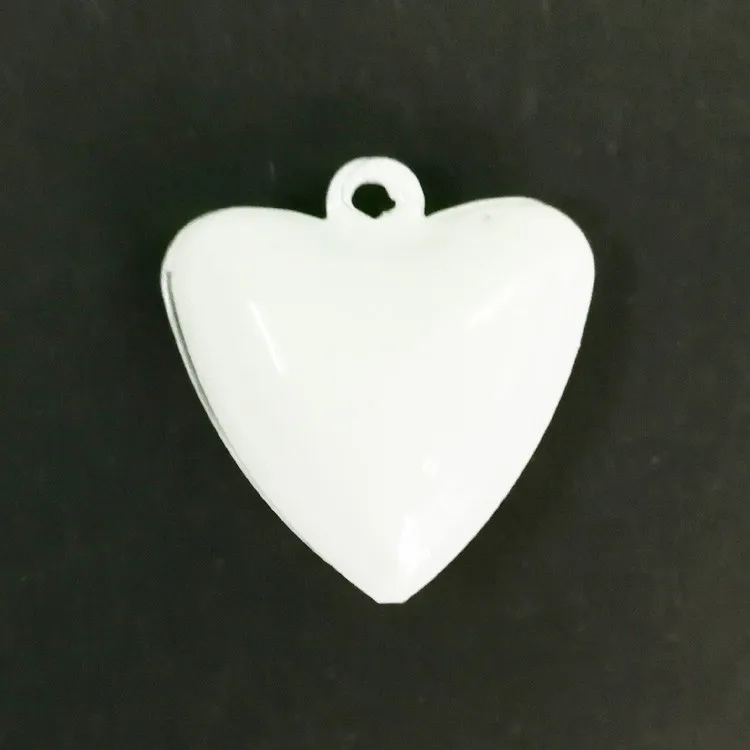 

New Designed OEM Service White Color Heart Shape Metal Christmas Jingle Bell