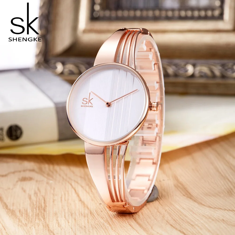 

SHENGKE Rosegold Femininity Watches New Stylish Wristwatchs Woman Dress Handwatches Mineral Glass Bracelet Watches