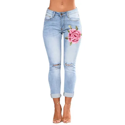 

High quality New hot sale denim hole shredded embroidered flowers woman jeans