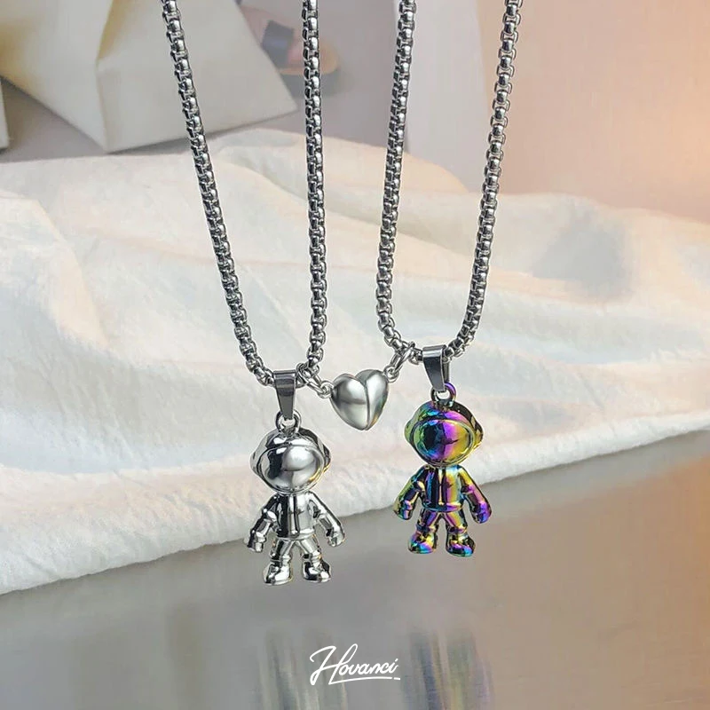 

HOVANCI Men Women Stainless Steel Astronaut Robot Pendant With Magnetic Necklace for Couple Men Women Spaceman Necklace