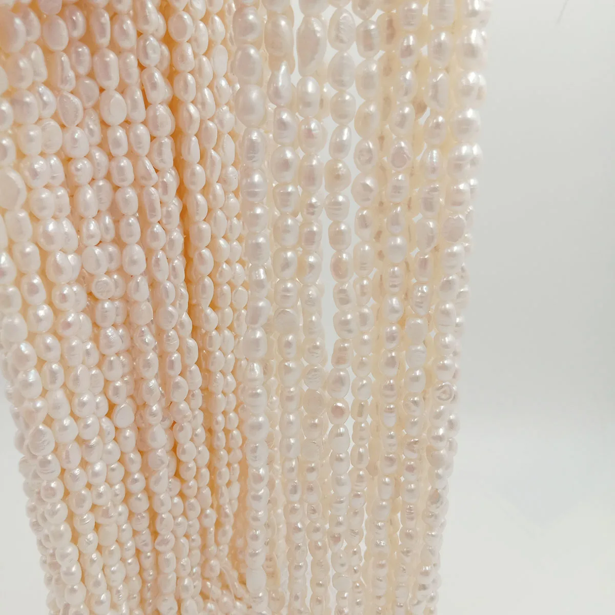 

100% nature freshwater pearl in strand width 6.3-7.3 mm long baroque pearl available in white