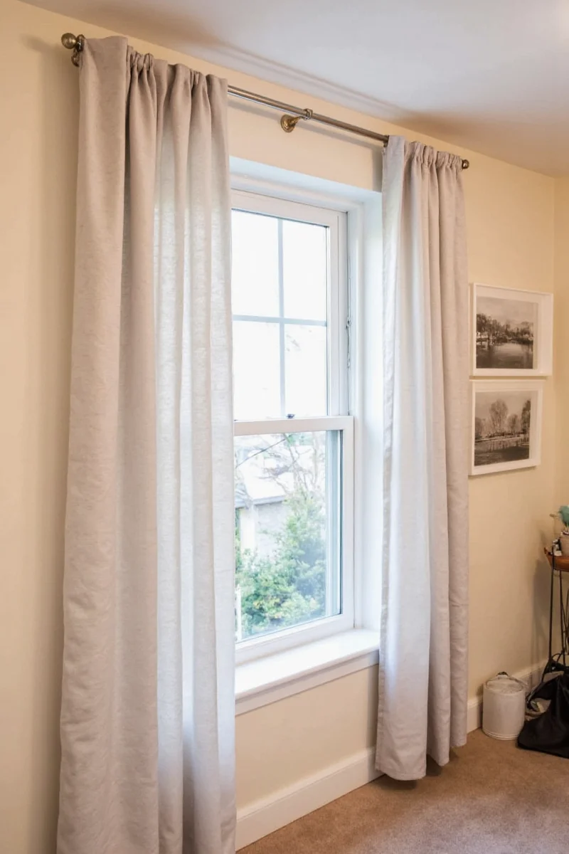 Curtain rod supported by Command hooks