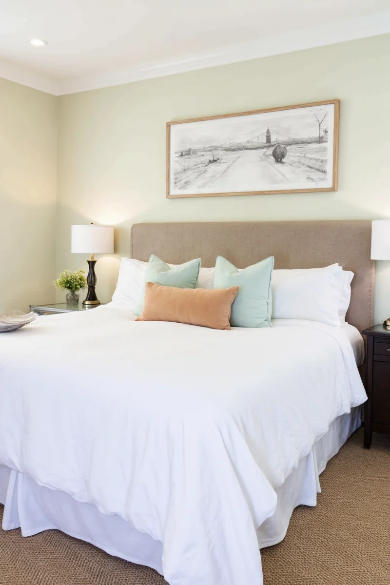 Floating shelves above headboard