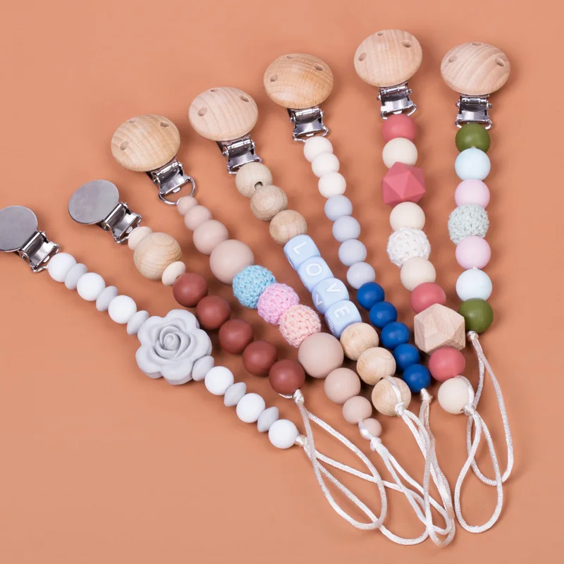 

Wholesales Christmas Type Round Beads Chain Dummy Clip Holder Case Silicone Baby Pacifier Clip