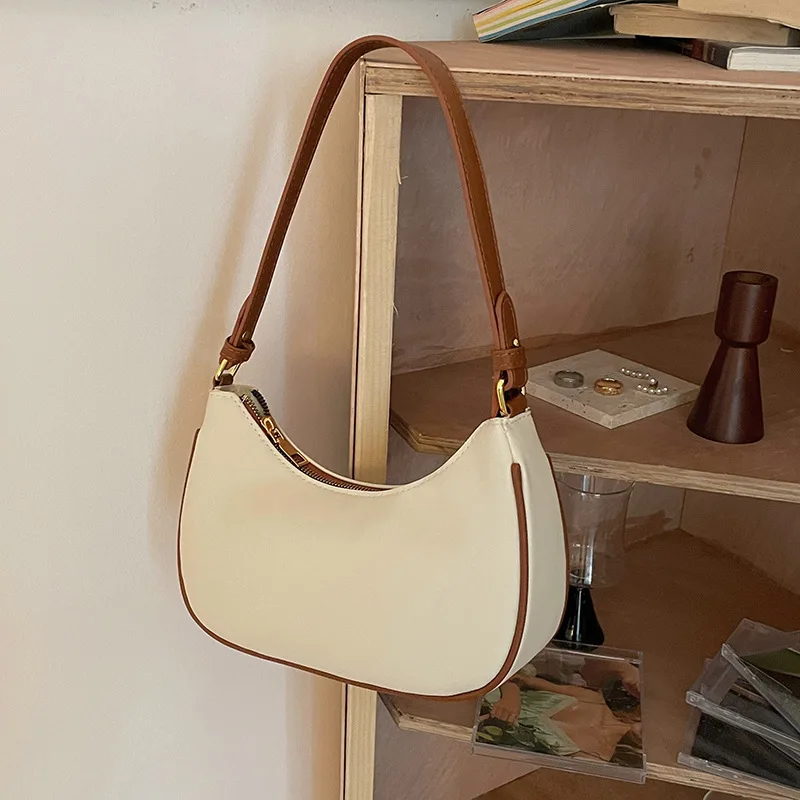 

hot selling armpit bag advanced foreign style shoulder handbag 2021 new contrast color fashion crescent saddle bag, Milky white