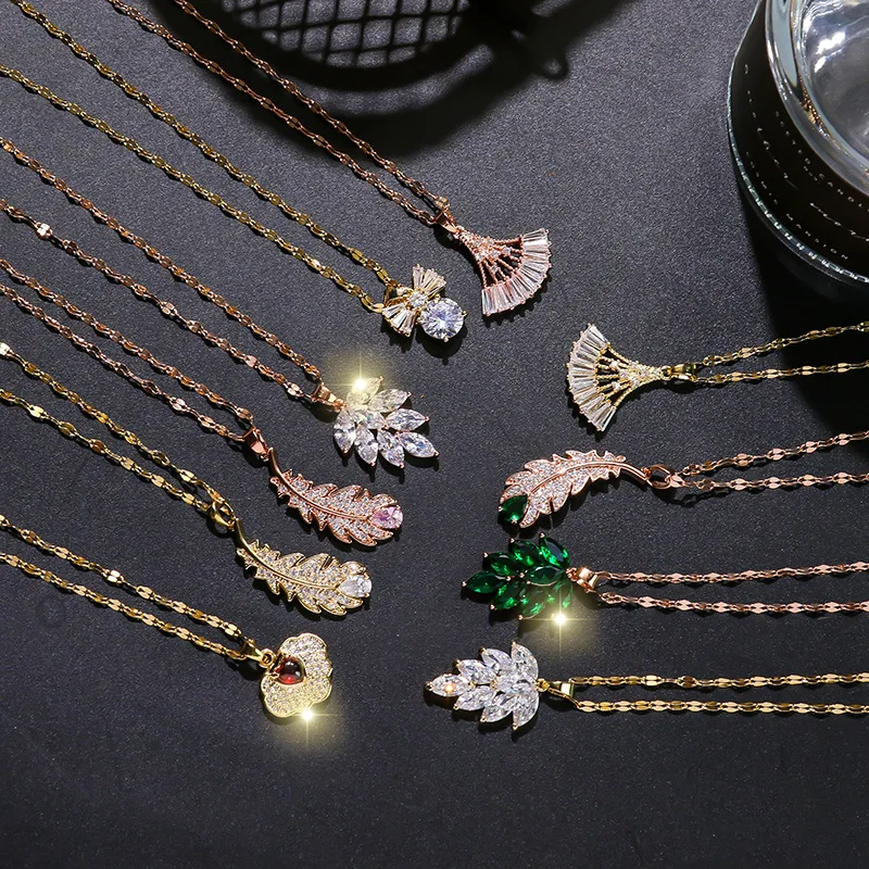 

Wholesale Fashion Luxury Crystal Gold Plated Stainless Steel Titanium Zircon Feather Leaf Pendant Necklace for Ladies, Rose gold