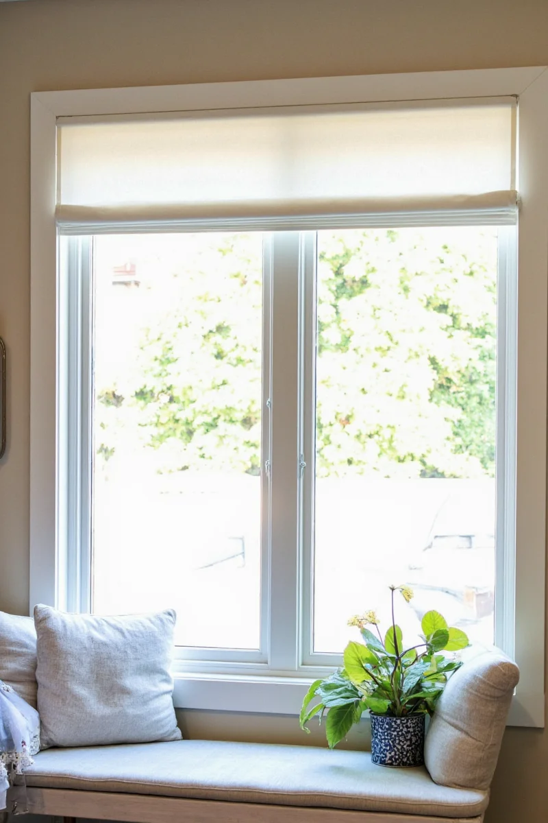 Kids helping to hang DIY curtains with fun themes