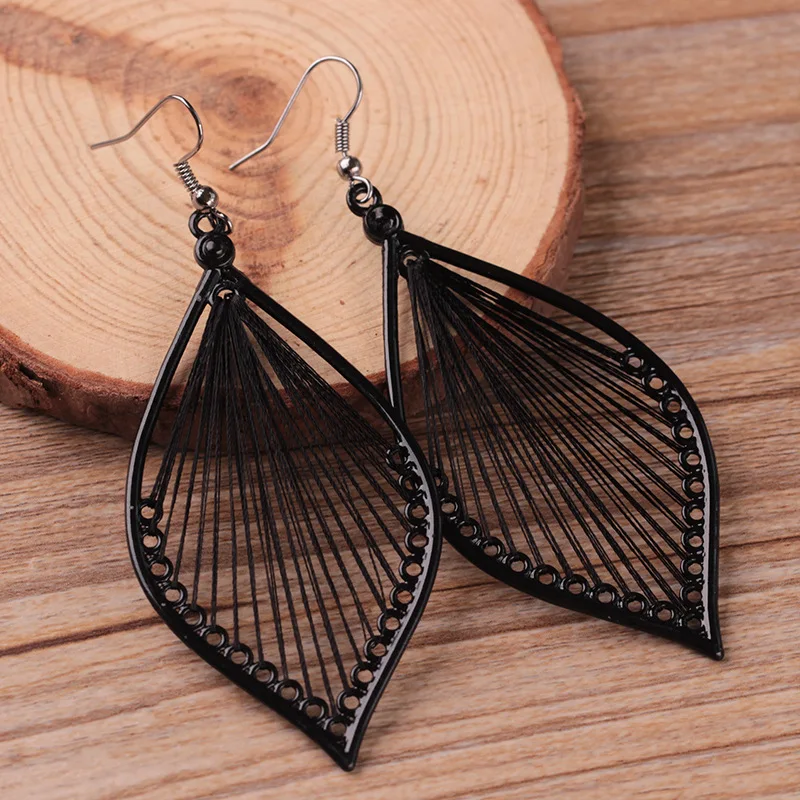 

Personalized handmade leaf earrings in Bohemian style exaggerated woven leaf stud earrings for women