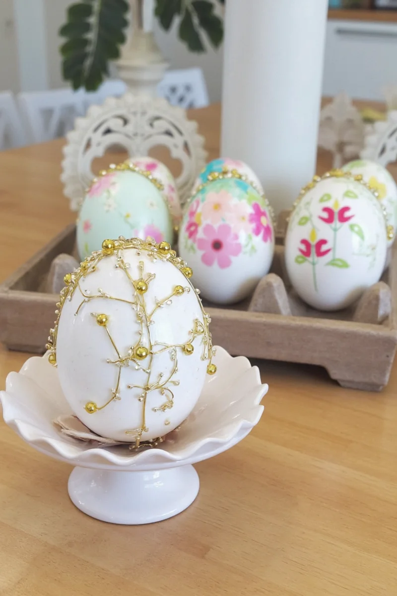 Side by side comparison of DIY painted eggs and pre-made plastic ones