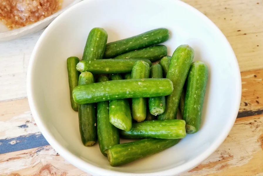 Serving banchan cucumbers on a wooden platter