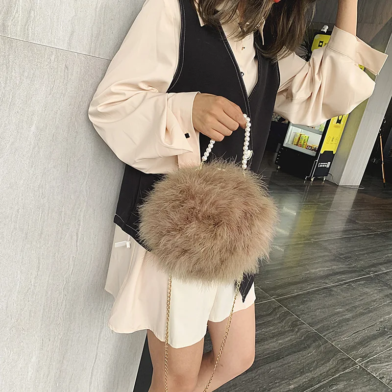 

Fashion new style turkey feather small shoulder bag messenger bag