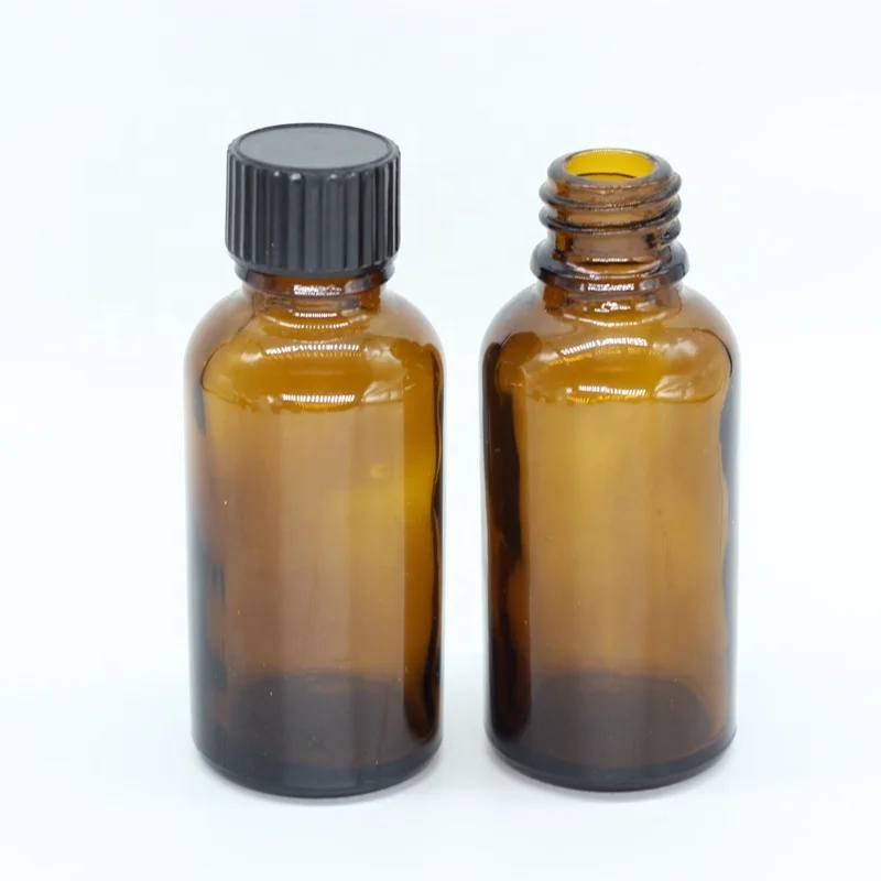 
20-400 Black poly cone/bakelite/phenolic cap fits 1 oz amber boston glass bottle 