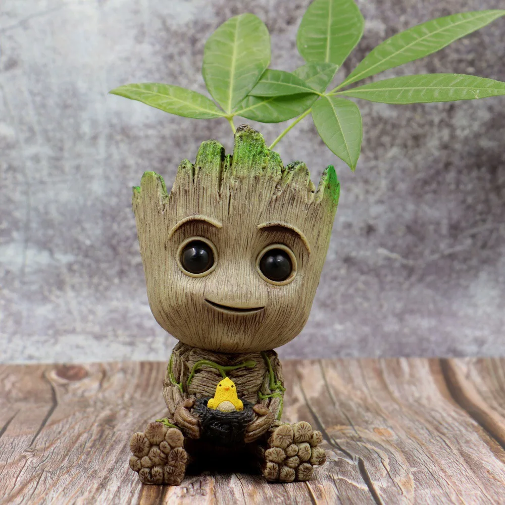 

Amazon hot sale PVC Stock Tree Man Pen Flower Pot The Galaxy baby groot flowerpot planter toy figure