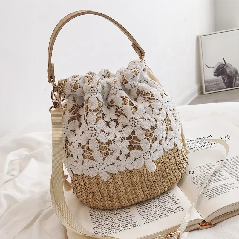 

Hot selling fresh straw Bucket Bag NEW fairy rattan beach holiday handbag leisure Messenger Bag Girl 2021, Flowers / leaves