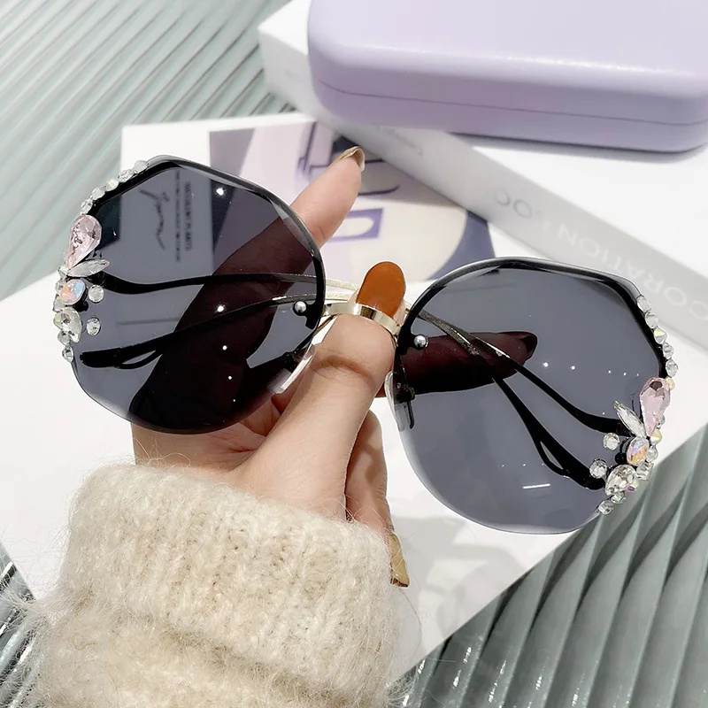 

new arrival 2022 fashionable Diamond frameless trimming sun glasses women's fashionable UV-proof sun glasses