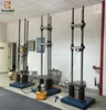 Creep testing machine for testing creep deformation of concrete