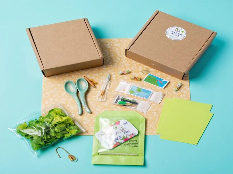 Eco-friendly craft kit with recycled materials and minimal packaging