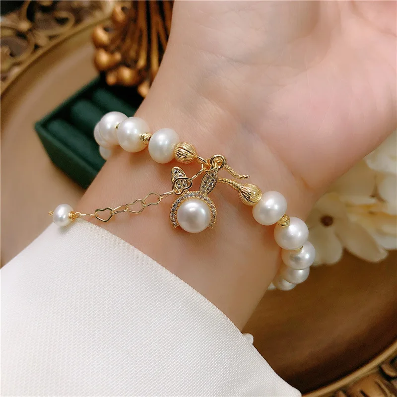 

Weihao European Micro-inlaid Bunny Pendant Bracelet Natural Freshwater Pearl Adjustable Bracelet, As picture show