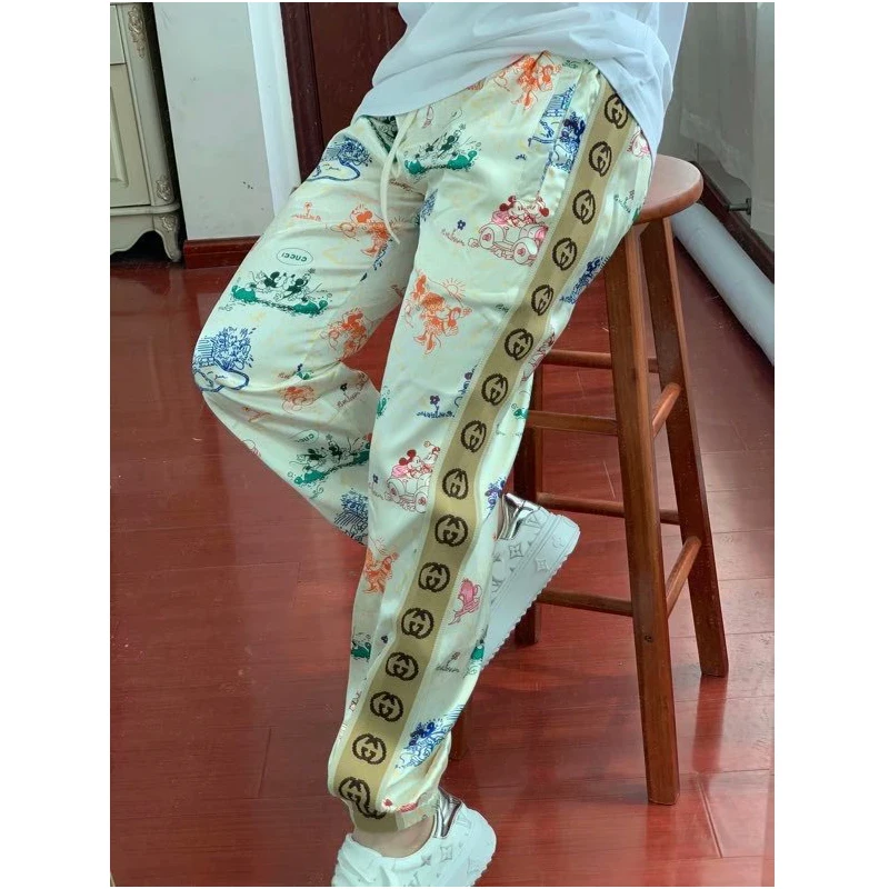 

New Beige cartoon casual pants women's fashionable mid waist micro trumpet casual pants