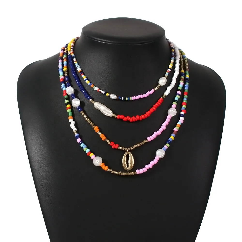 

Bohemian Ethnic style rice bead necklace female ethnic style imitation pearl clavicle chain alloy pendant Multi-Layer Necklace