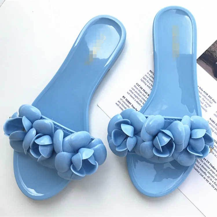 

2022 Wholesaler girls summer beach flat jelly shoes female Camellia flower open toe flat slippers one-piece chic for women