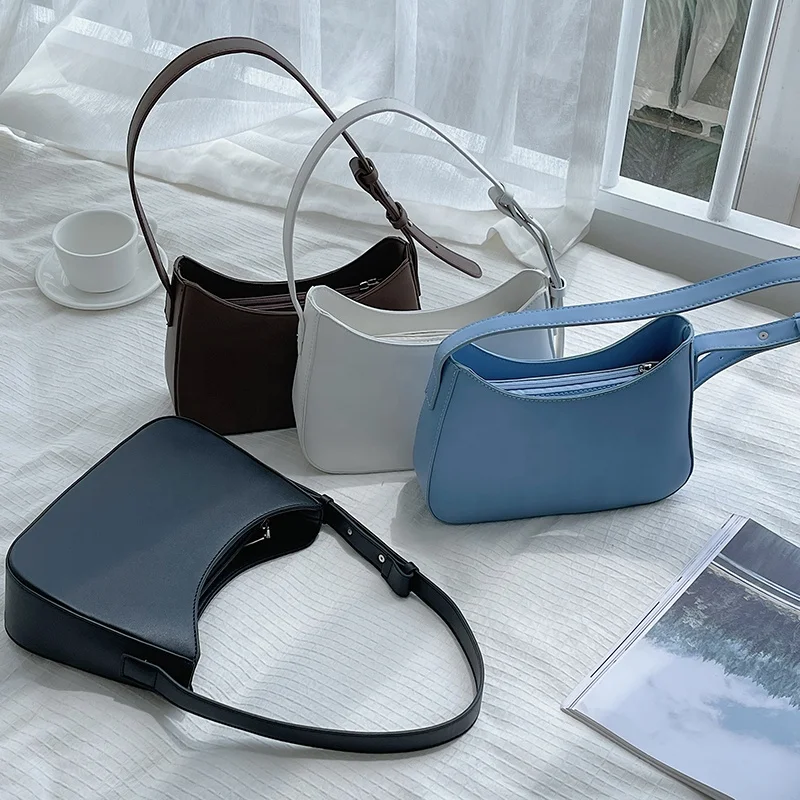 

Korean version of women's new solid color design handbag trend all-match shoulder bag fashionable temperament armpit bag