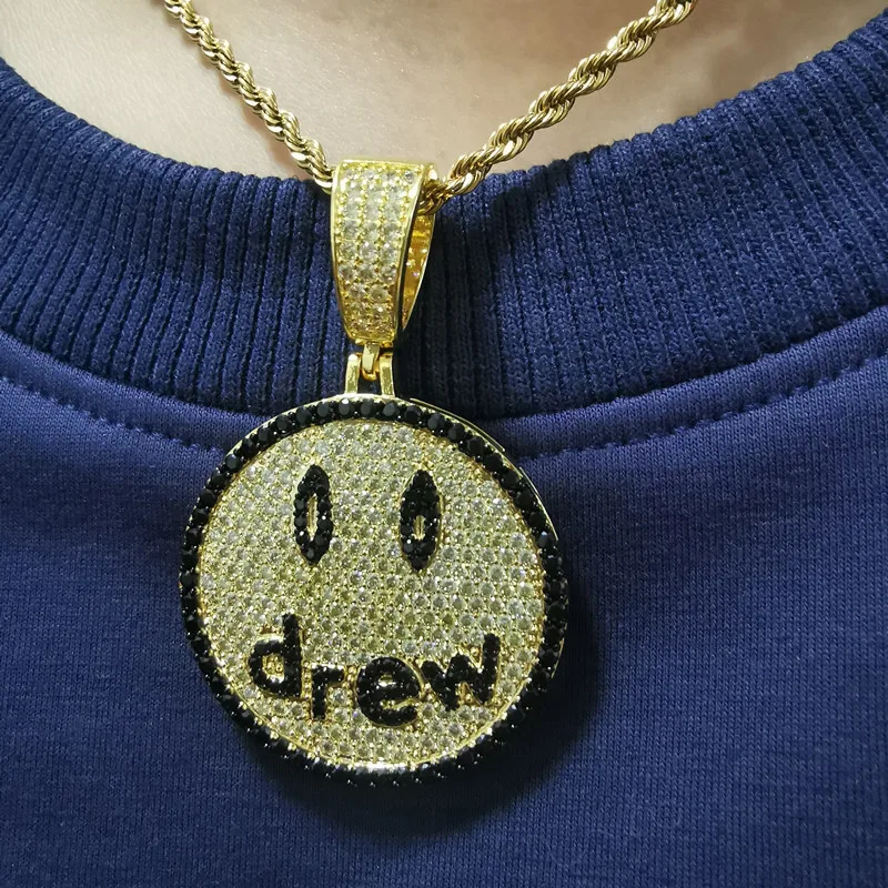 

Justin Bieber's Drew Smiley face ice out zircon diamond necklace and diamond Kanye Pendant copper rhinestone necklace